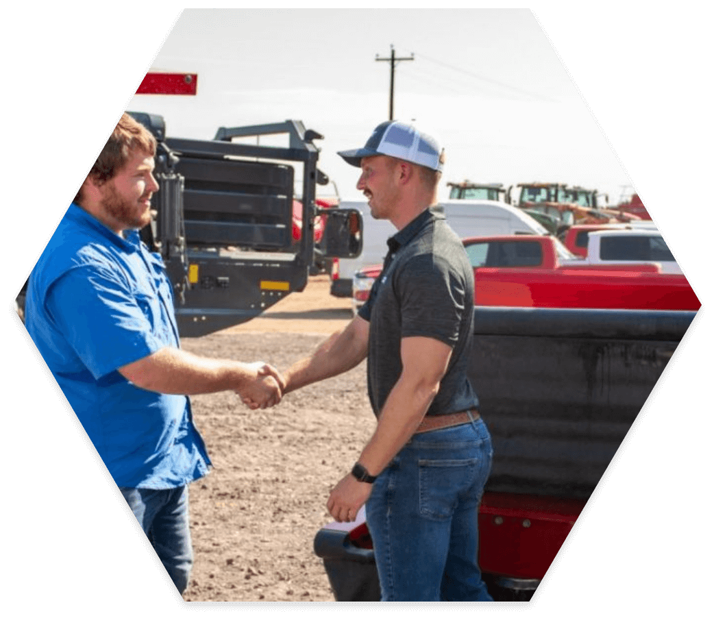 Salesperson shaking hands with a satisfied customer