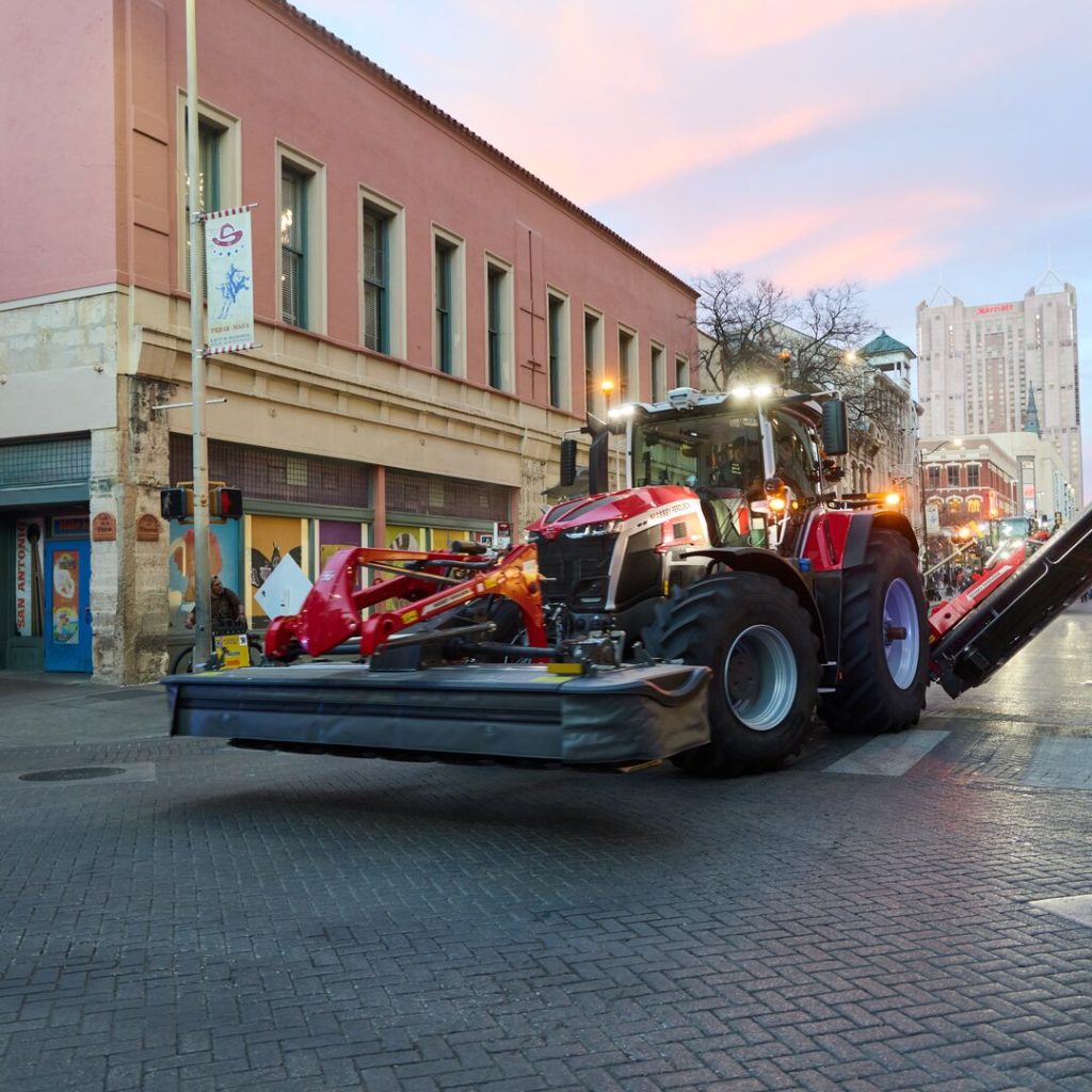 Massey Ferguson tractor with triple windrower attachment takes on the streets of San Antonio after Commodity Classic 2026